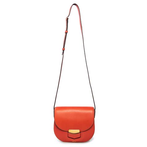 celine trotteur small red|Small Trotteur bag in grained calfskin .